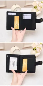 Detail view of RFID protected wallet interiors with multiple card slots and leather texture
