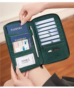 Detail view of large RFID blocking travel organizer with multiple card slots and passport slots