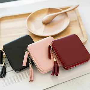 Elegant square zip wallets for women with tassels in black, pink, and burgundy colors