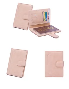 Detailed internal view of RFID pink faux leather passport holder with card slots