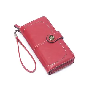 Deep red long leather wallet for women with brogue hollow carving and zipper