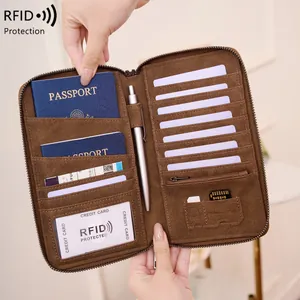 Brown leather RFID travel wallet with large capacity passport and card storage slots