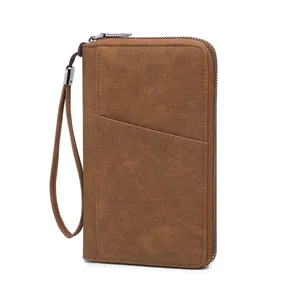 Brown long leather RFID blocking passport wallet with wrist strap and zipper closure