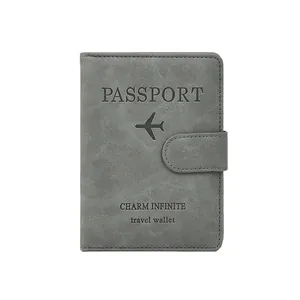 Cartera de pasaporte RFID gris oscuro en cuero PU texturizado con cierre de presión