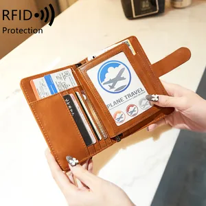 Brown leather RFID blocking passport holder and multi-functional travel wallet with card slots
