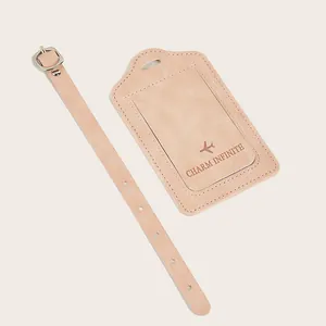 Pink PU leather luggage tag with airplane icon and adjustable strap for travel bags
