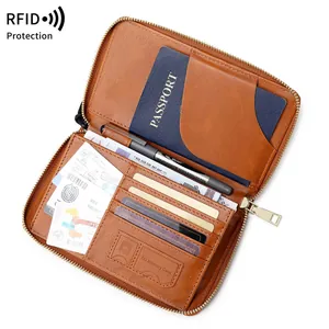 Brown RFID blocking travel passport wallet organizer with multi-card slots and zipper
