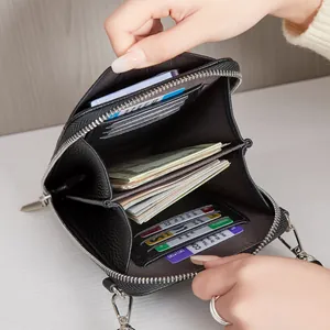 Sac bandoulière en cuir noir à motif lychee avec compartiments internes multicouches