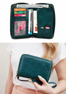 Detalle de cartera para pasaporte con bloqueo RFID, ranuras múltiples y cremallera