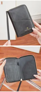 Detailed view of RFID passport holder interior with card slots and travel pen loop