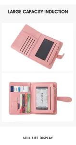 Detail of pink PU leather travel wallet showing multiple card slots and internal storage