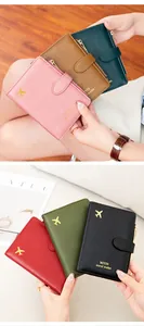 Slim RFID travel passport wallets in multiple colors with gold airplane logo detail