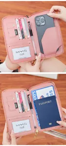 Portefeuille passeport rose RFID avec fentes pour cartes et compartiment de voyage