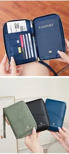 Detail of RFID passport holder interior featuring card slots and pen loop for travel