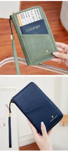 Détail du protège-passeport RFID avec texture litchi fine et fermeture éclair sûre