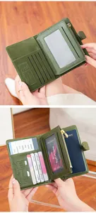 Detail of RFID green leather passport holder with multi-card slots and SD card pocket