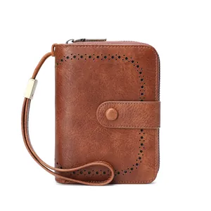 Vintage brown leather RFID wallet for women with zip pocket and wrist strap