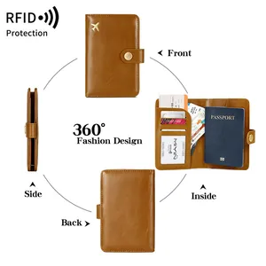 Brown leather RFID blocking passport holder with airplane logo and multi-slot interior