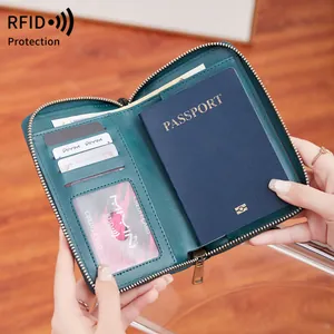 Cartera para pasaporte RFID azul oscuro con ranuras para tarjetas y cierre de cremallera