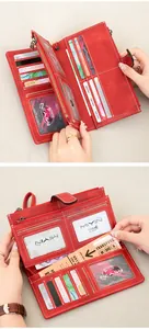 Detail view of red RFID blocking wallet featuring multiple card slots and leather texture