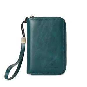 Cartera de pasaporte RFID de cuero verde oscuro con correa de muñeca y cierre de cremallera