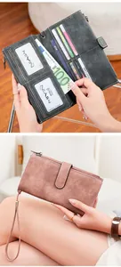 Detail of RFID blocking women's tri-fold leather wallet showing internal card slots and compartments