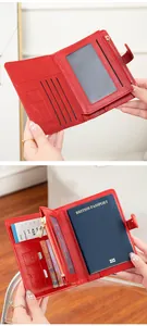 Detail of red RFID passport wallet with multiple slots for cards, SIM and documents