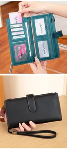 Detail of RFID blocking leather wallet with multiple card slots and litchi texture