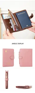 Detail view of pink RFID passport holder with internal card slots and zipper coin pocket