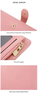 Detail view of pink RFID passport wallet showing snap closure, zipper and soft texture