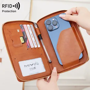 Portefeuille passeport RFID en cuir marron avec fentes pour cartes et support mobile