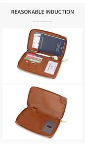 Detail view of brown leather RFID passport travel wallet showing inner card slots and pen holder