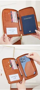 Detail view of RFID travel wallet with passport slot, card holders, and smartphone pocket