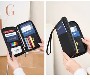 Détails du grand portefeuille de voyage RFID noir avec fentes passeport et porte-cartes