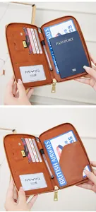 Detailed view of RFID brown leather travel wallet with passport, cards and pen slots