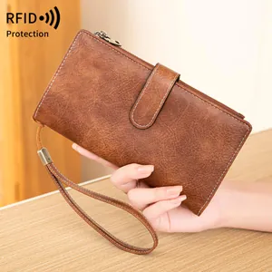 Retro brown leather RFID blocking long wallet for women with wristlet and secure zipper