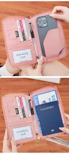 Pink RFID travel passport wallet interior with multiple card slots and phone pocket