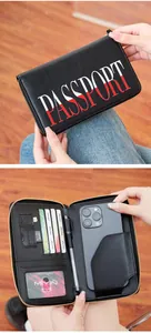 Detail view of RFID passport wallet with card slots, phone pocket and pen holder compartment