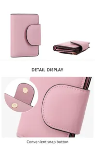 Détail du portefeuille en cuir rose avec bouton pression métallique pratique