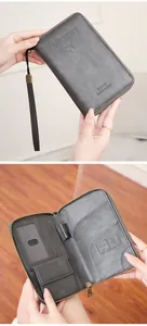 Detail of grey RFID travel wallet interior with card slots, passport holder and zipper