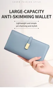 Detail of blue RFID blocking long wallet showing sleek design and metallic buckle closure