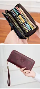 Detailed view of large capacity RFID long wallet with multiple card slots and wrist strap