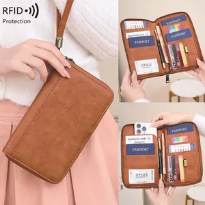 Porte-Passeport de Voyage Multifonctionnel en Cuir PU avec Protection RFID Portefeuille Grande Capacité Sac à Documents avec Dragonne