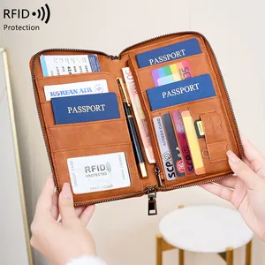 Portefeuille passeport RFID en cuir marron avec fentes multiples et fermeture éclair