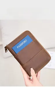 Detail of RFID blocking brown crazy horse leather passport wallet with dual card slots