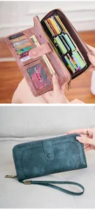 Detail of RFID long wallet showing multi-card slots and laser-cut hollow pattern