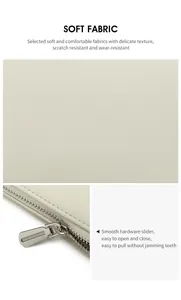 Détail de la texture en cuir blanc cassé et fermeture éclair en métal argenté de la pochette