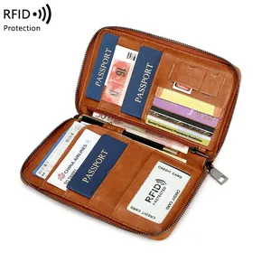 Protège-passeport RFID en cuir marron avec fentes pour cartes et poches multifonctions