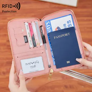 Pink RFID blocking passport wallet with multi-functional card slots and pen holder