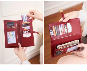 Detail of dark red RFID blocking long wallet showing card slots and zipper compartment